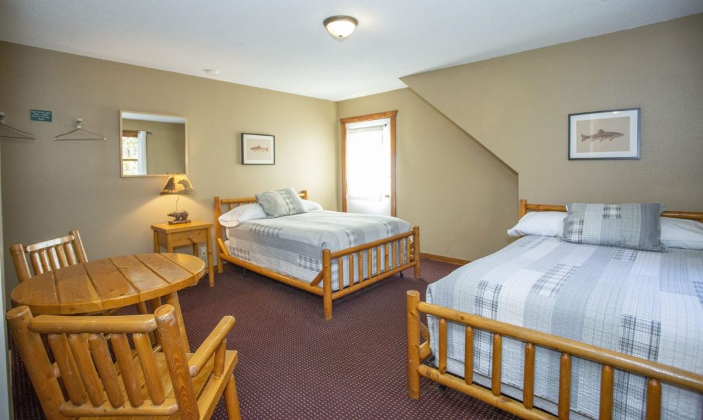 Lodge room with multiple beds